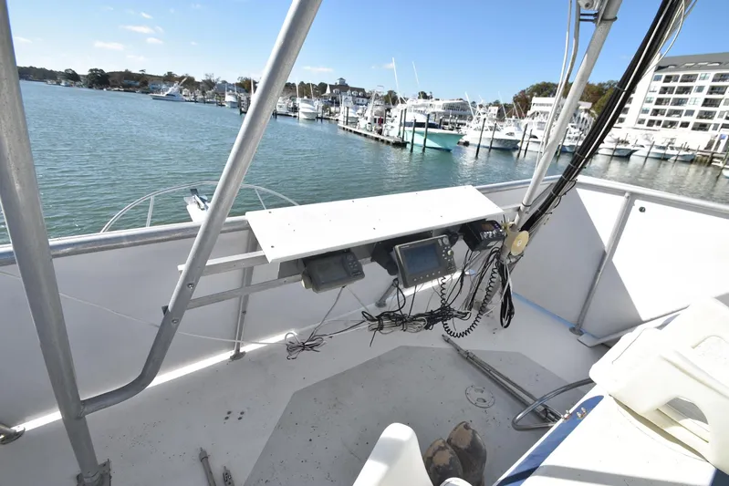 Ocean Explorer Yacht Photos Pics Boat helm with navigation equipment, overlooking marina. Custom 45 Doucette, 2006 model.
