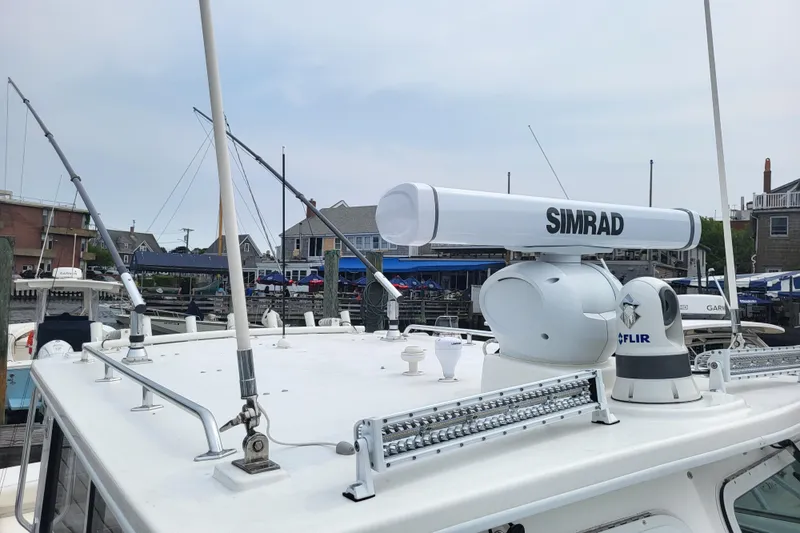  Yacht Photos Pics 2023 Steiger Craft 31 Fisherman with Simrad and FLIR equipment at a marina.