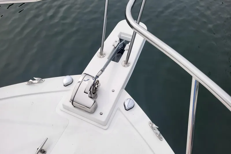  Yacht Photos Pics Bow of 2023 Steiger Craft 31 Fisherman with anchor and railing.