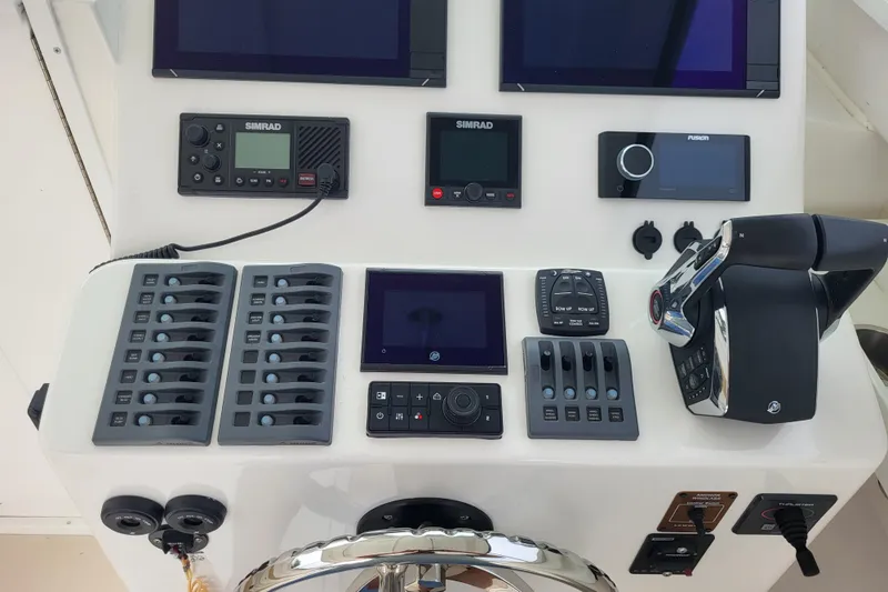  Yacht Photos Pics Control panel of 2023 Steiger Craft 31 Fisherman with navigation and communication equipment.