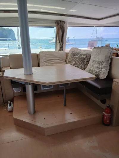 Raiatea Yacht Photos Pics Interior of 2015 Bali 4.5 catamaran with cozy seating and ocean view.