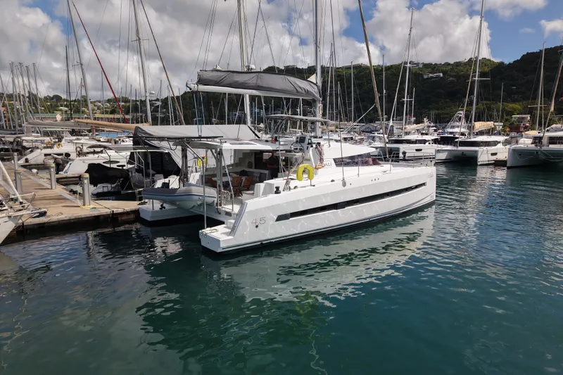 Raiatea Yacht Photos Pics Bali 4.5 catamaran docked in marina, surrounded by other boats, 2015 model.