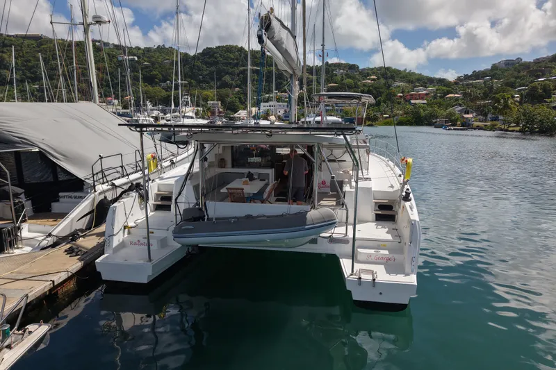 Raiatea Yacht Photos Pics Bali 4.5 catamaran docked in a scenic marina, 2015 model.
