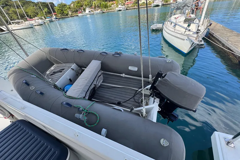 Raiatea Yacht Photos Pics Inflatable boat docked in marina, featuring a Bali 4.5 model from 2015.