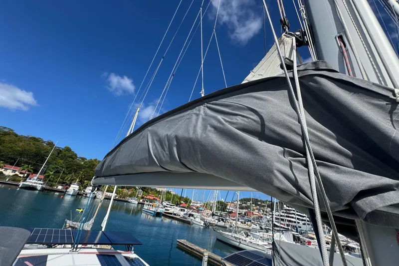 Raiatea Yacht Photos Pics Sailboat in marina with clear blue sky, featuring Bali 4.5 model, 2015.