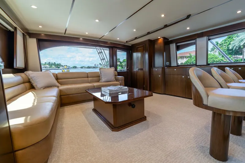 The Provider Yacht Photos Pics Luxurious interior of 2015 Viking 76 Convertible yacht with plush seating and elegant wood finishes.