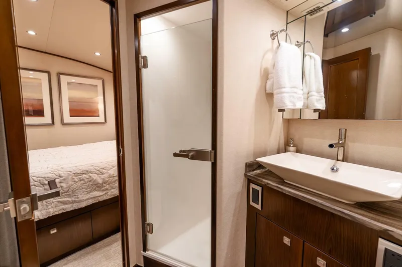 The Provider Yacht Photos Pics Luxurious bathroom and bedroom in 2015 Viking 76 Convertible yacht.