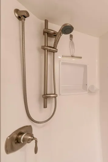 The Provider Yacht Photos Pics Modern shower fixture in a 2015 Viking 76 Convertible yacht bathroom.