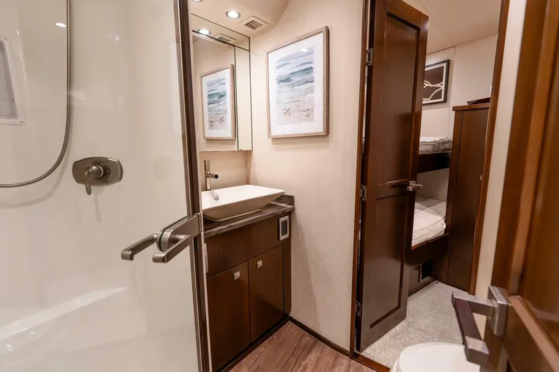 The Provider Yacht Photos Pics Luxurious bathroom and cabin interior of 2015 Viking 76 Convertible yacht.