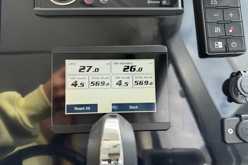  Yacht Photos Pics Dashboard of 2022 Jeanneau NC Weekender 1095 showing trip data and fuel usage.