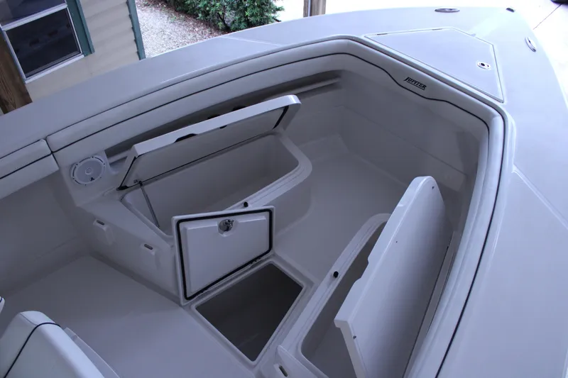  Yacht Photos Pics 2017 Jupiter 30 HFS boat interior with open storage compartments.
