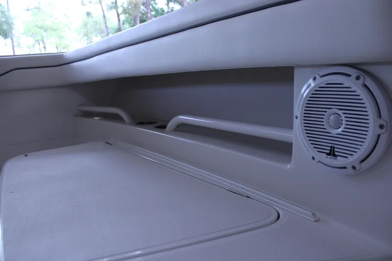  Yacht Photos Pics Interior of 2017 Jupiter 30 HFS boat with speaker and storage compartment.