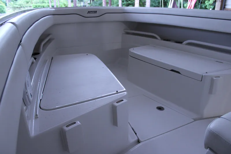  Yacht Photos Pics 2017 Jupiter 30 HFS boat interior with seating and storage compartments.
