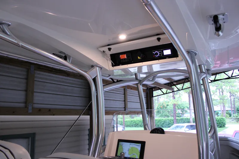  Yacht Photos Pics 2017 Jupiter 30 HFS boat interior with navigation equipment and stainless steel framework.