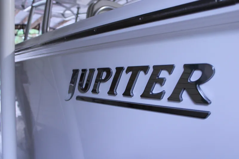  Yacht Photos Pics 2017 Jupiter 30 HFS boat with chrome lettering on the side.