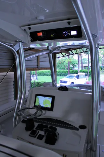  Yacht Photos Pics 2017 Jupiter 30 HFS boat dashboard with navigation screen and controls.