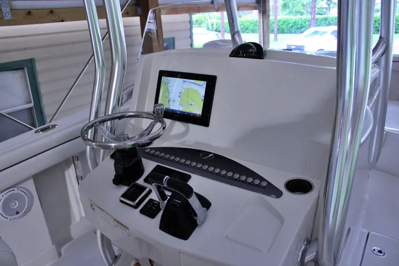  Yacht Photos Pics 2017 Jupiter 30 HFS boat console with steering wheel and navigation display.