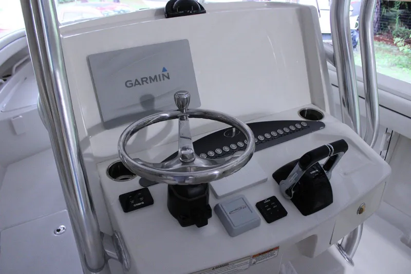  Yacht Photos Pics 2017 Jupiter 30 HFS boat helm with Garmin navigation system and steering wheel.