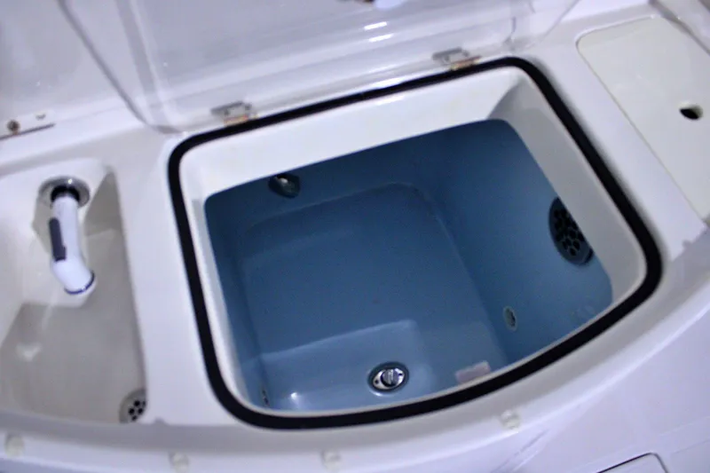  Yacht Photos Pics Livewell compartment on a 2017 Jupiter 30 HFS boat, open and empty.