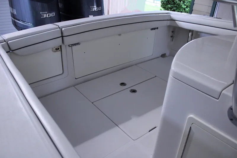  Yacht Photos Pics 2017 Jupiter 30 HFS boat interior with Yamaha 300 engines, showcasing spacious seating and storage.