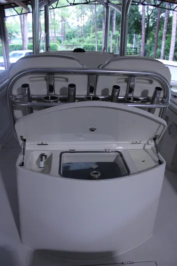  Yacht Photos Pics 2017 Jupiter 30 HFS boat with open storage compartment and rod holders.