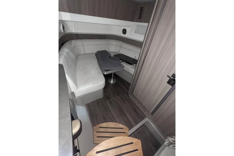  Yacht Photos Pics 2017 Sea Ray SLX 400 cabin interior with modern seating and wooden accents.