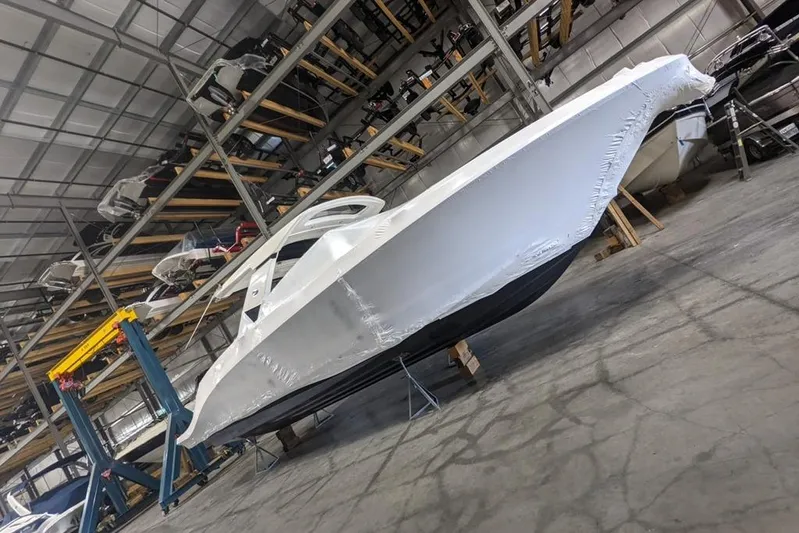  Yacht Photos Pics 2017 Sea Ray SLX 400 boat stored in a warehouse, covered and elevated.