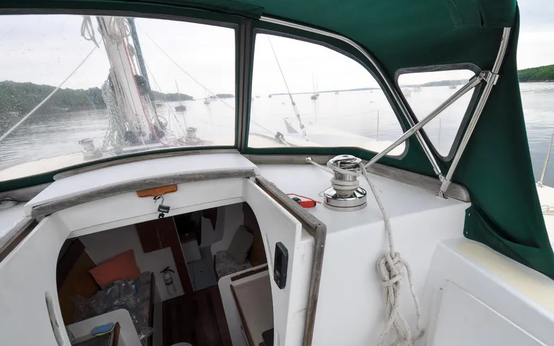 If Yacht Photos Pics 2018 Marples CC 40 Fast Cruiser interior view with green canopy and visible cabin entrance.