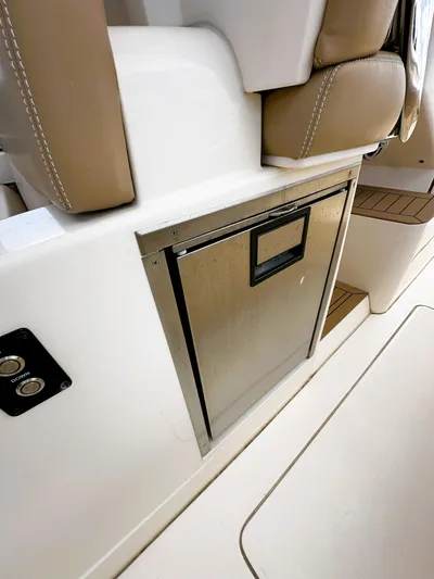  Yacht Photos Pics 2020 Scout 380 LXF boat interior with built-in stainless steel storage compartment.