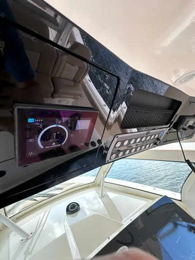  Yacht Photos Pics 2020 Scout 380 LXF boat dashboard with digital display and controls.