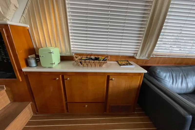  Yacht Photos Pics Interior of 2002 Navigator Classic 53 yacht with mini fridge and basket on counter.