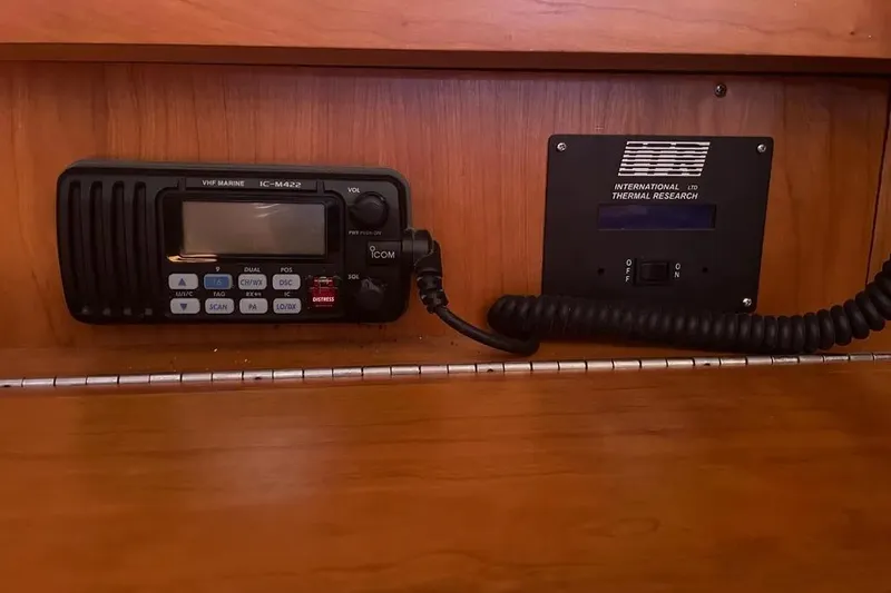 Mistral X Yacht Photos Pics VHF marine radio and control panel in 2009 Tartan 4300 yacht interior.