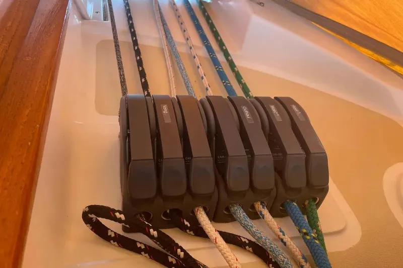 Mistral X Yacht Photos Pics Close-up of rope clutches on a 2009 Tartan 4300 sailboat deck.