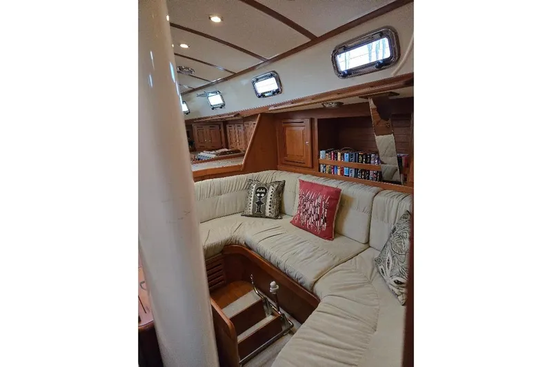 Mistral X Yacht Photos Pics Luxurious 2009 Tartan 4300 yacht interior with cozy seating and elegant wood finish.
