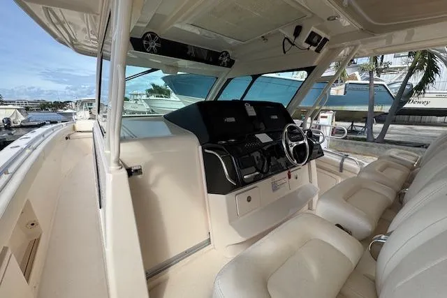  Yacht Photos Pics 2024 Grady-White Canyon 456 boat interior with modern helm and seating.