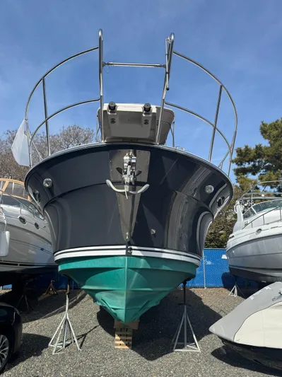  Yacht Photos Pics 2021 Cutwater C-32 CB boat on stands, front view, outdoors.