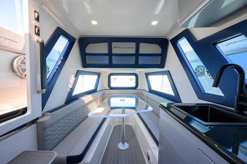 Palladium Yacht Photos Pics Midnight Express 43 PALLADIUM - Cabin Seating, Table, & Galley
