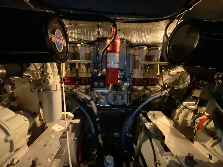  Yacht Photos Pics Engine room of a 1993 Sea Ray 500 Sundancer yacht with visible machinery.