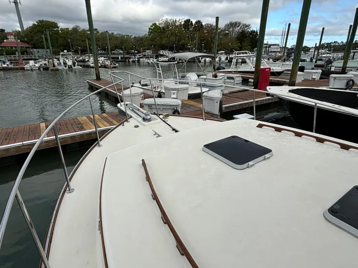 Gullywhumper Yacht Photos Pics 2001 Ellis 36 Flybridge yacht docked at marina with surrounding boats.