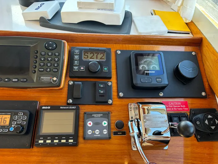 Gullywhumper Yacht Photos Pics Control panel of a 2001 Ellis 36 Flybridge boat with navigation instruments.