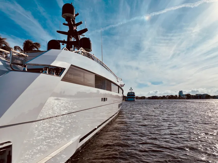  Yacht Photos Pics 2024 Rossinavi 49M Sport Yacht on water under blue sky.