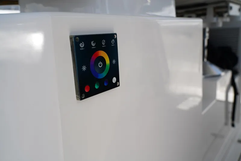  Yacht Photos Pics Control panel on a 2022 Pursuit 428 boat, featuring a colorful interface.