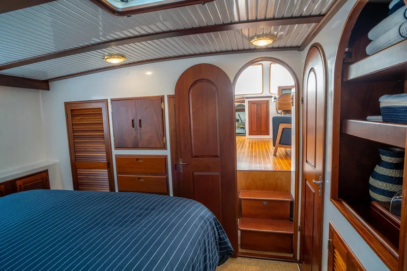 Irish Ayes Yacht Photos Pics Luxurious cabin interior of 1993 Atlantic Duffy 48 yacht with wooden furnishings.