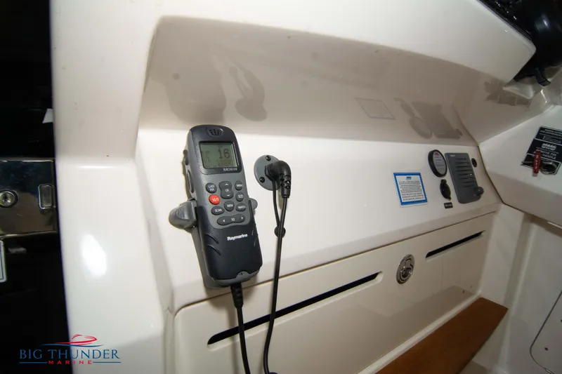  Yacht Photos Pics Control panel of 2012 Sea Ray 410 Sundancer with marine radio and gauges.