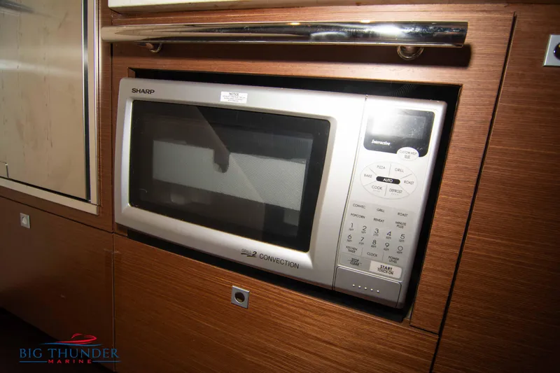  Yacht Photos Pics Built-in microwave in 2012 Sea Ray 410 Sundancer yacht kitchen.