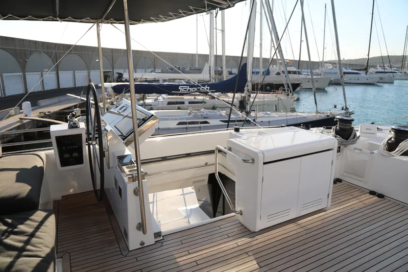  Yacht Photos Pics Luxurious 2020 Lagoon 620 yacht interior with modern helm and spacious deck.