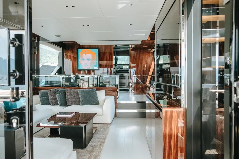 4990 Yacht Photos Pics Luxurious interior of 2024 Riva 82' Diva yacht with modern decor and plush seating.