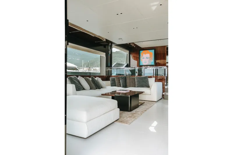 4990 Yacht Photos Pics Luxurious interior of 2024 Riva 82' Diva yacht with modern decor and plush seating.