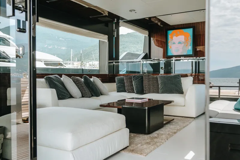 4990 Yacht Photos Pics Luxurious interior of 2024 Riva 82' Diva yacht with modern decor and scenic views.
