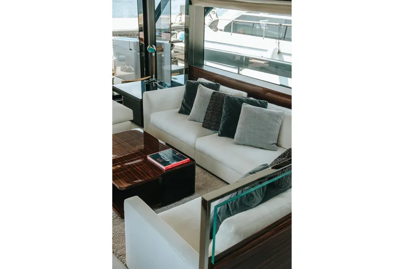 4990 Yacht Photos Pics Luxurious interior of 2024 Riva 82' Diva yacht with elegant seating and cushions.